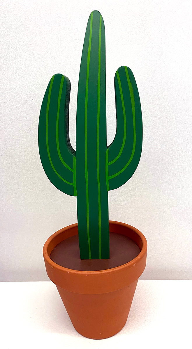 wooden sculpture of a cactus in terracotta pot