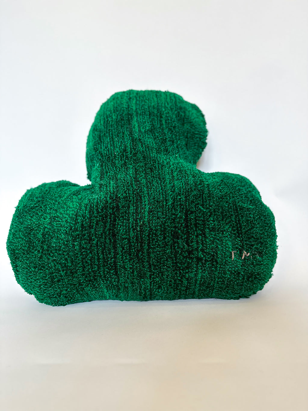 Soft sculpture of a green leaf 